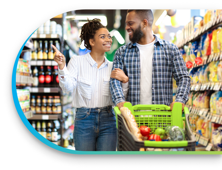 a couple shopping in a grocery store