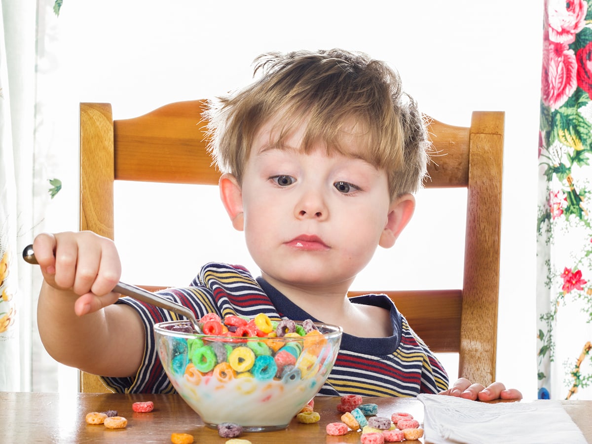 child eating cereal