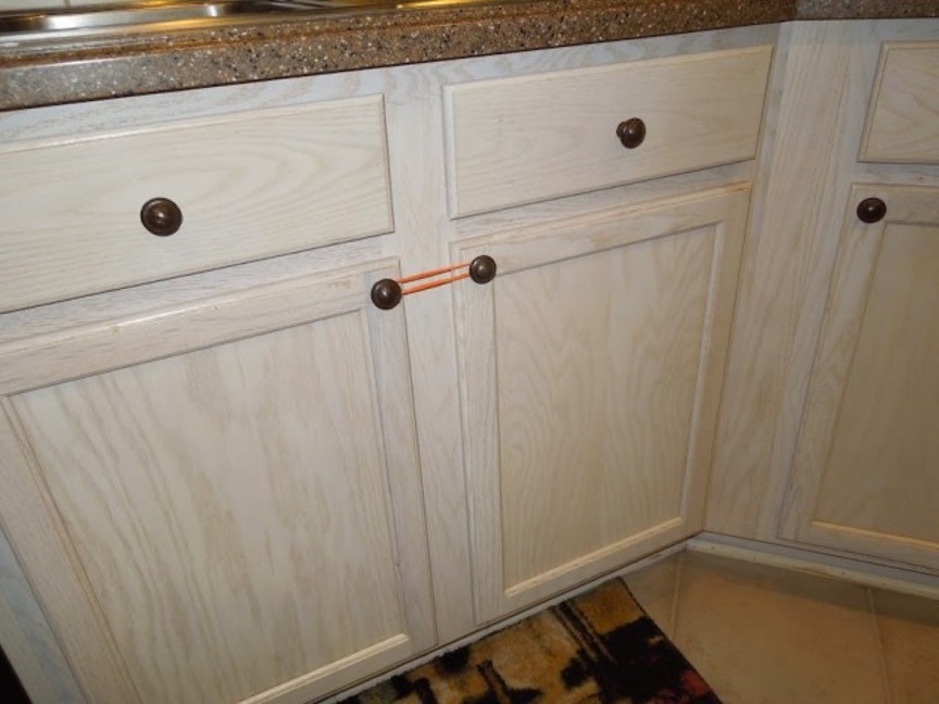 rubber bands closing a cabinet